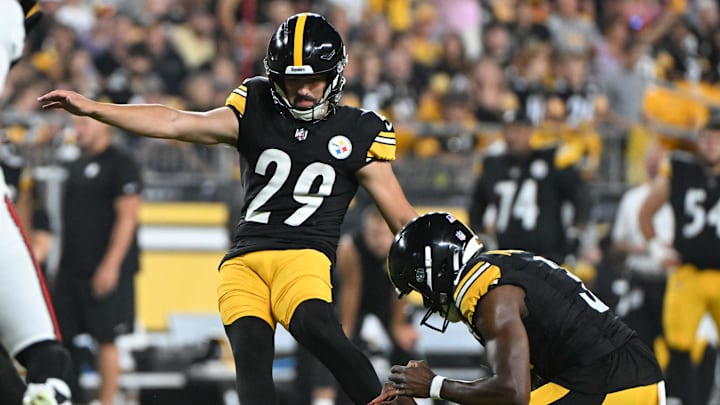 Aug 16, 2025; Pittsburgh, Pennsylvania, USA; Pittsburgh Steelers place kicker Ben Sauls (29) kicks an extra point against the Tampa Bay Buccaneers during the second quarter at Acrisure Stadium. Mandatory Credit: Barry Reeger-Imagn Images