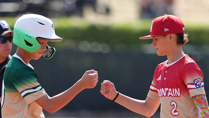 Tsai Yu-Ge (10) of Asia-Pacific Region reacts with Ethan Robertson (2) of Mountain Region