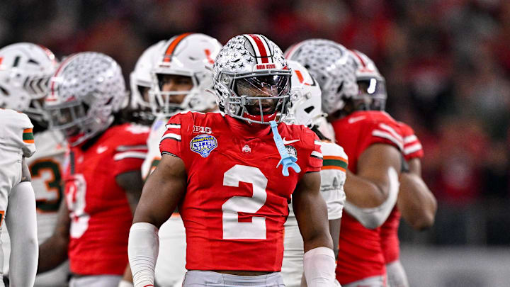 Dec 31, 2025; Arlington, TX, USA; Ohio State Buckeyes safety Caleb Downs (2) celebrates a defensive stop during the 2025 Cotton Bowl and quarterfinal game of the College Football Playoff at AT&T Stadium. Mandatory Credit: Jerome Miron-Imagn Images Dec 31, 2025; Arlington, TX, USA; Ohio State Buckeyes safety Caleb Downs (2) celebrates a defensive stop during the 2025 Cotton Bowl and quarterfinal game of the College Football Playoff at AT&T Stadium. Mandatory Credit: Jerome Miron-Imagn Images