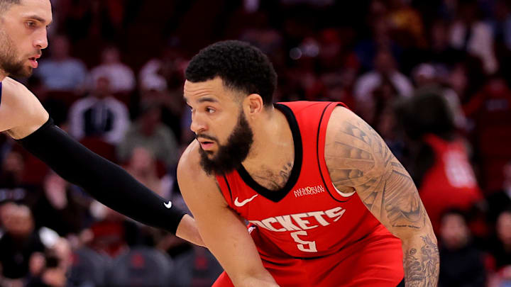 Mar 1, 2025; Houston, Texas, USA; Houston Rockets guard Fred VanVleet (5) handles the ball against Sacramento Kings guard Zach LaVine (8) during the first quarter at Toyota Center. Mandatory Credit: Erik Williams-Imagn Images