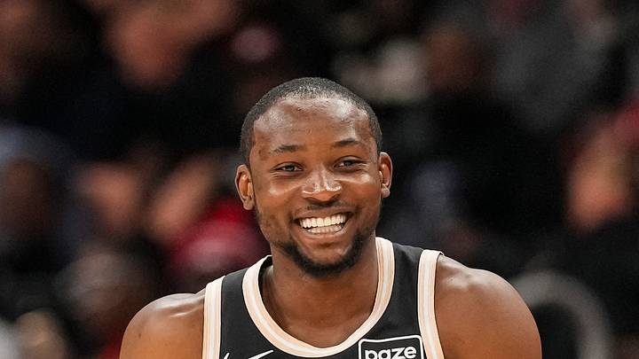 Atlanta Hawks forward Jonathan Kuminga (0) reacts after making a three point shot against the Washington Wizards during the first half at State Farm Arena on Feb 26, 2026.