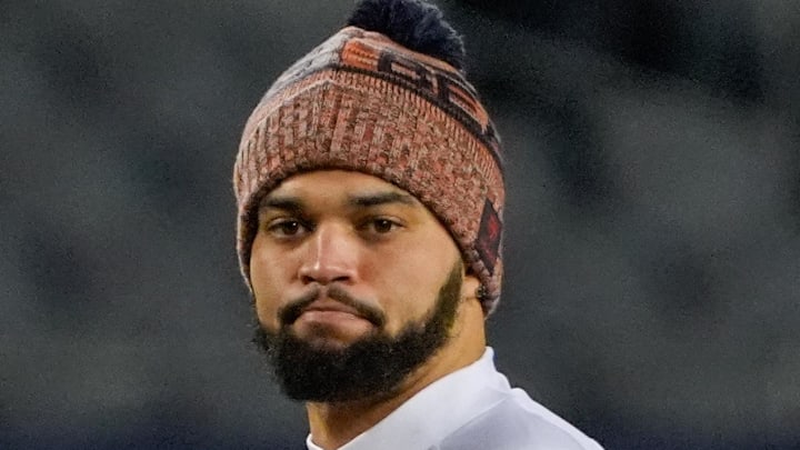 Chicago Bears quarterback Caleb Williams (18) warms up prior to an NFC Wild Card Round game against the Green Bay Packers at Soldier Field. Mandatory Credit: David Banks-Imagn Images