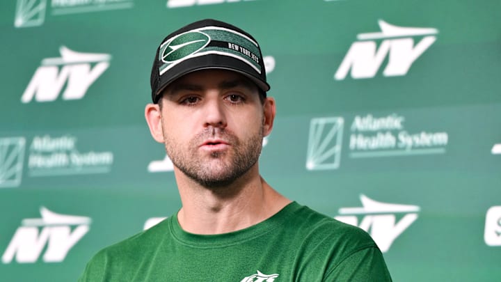 Former New York Jets offensive coordinator Tanner Engstrand speaks at a press conference during minicamp 