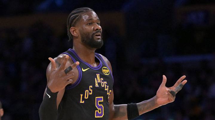 Apr 21, 2026; Los Angeles, California, USA; Los Angeles Lakers center Deandre Ayton (5) reacts on the court after a three-point basket by guard Marcus Smart (36) in the first half of game two of the first round of the 2026 NBA Playoffs against the Houston Rockets at Crypto.com Arena. Mandatory Credit: Jayne Kamin-Oncea-Imagn Images