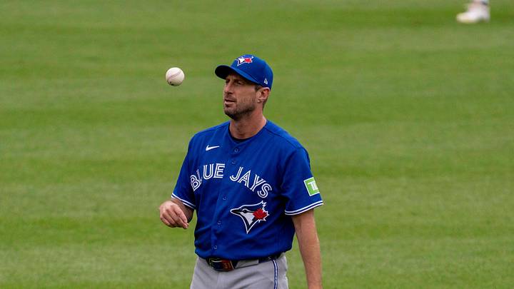 Sep 23, 2026; Baltimore, Maryland, USA;  Toronto Blue Jays pitcher Max Scherzer (31) tosses the ball before the game at Oriole Park at Camden Yards.  Mandatory Credit: Jamie LeBlanc-Imagn Images