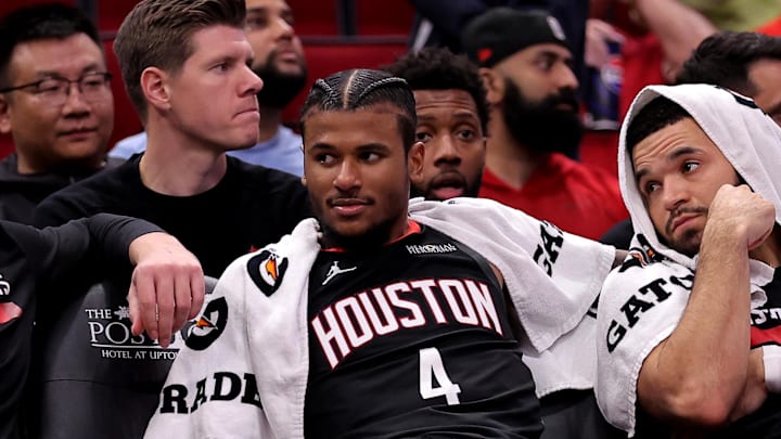 Nov 22, 2024; Houston, Texas, USA; Houston Rockets forward Dillon Brooks (9), center Alperen Sengun (28), guard Jalen Green (4) and guard Fred VanVleet (5) sit on the bench against the Portland Trailblazers during the fourth quarter at Toyota Center. Mandatory Credit: Erik Williams-Imagn Images