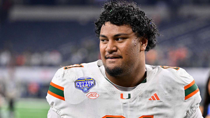 Miami Hurricanes offensive lineman Francis Mauigoa (61)