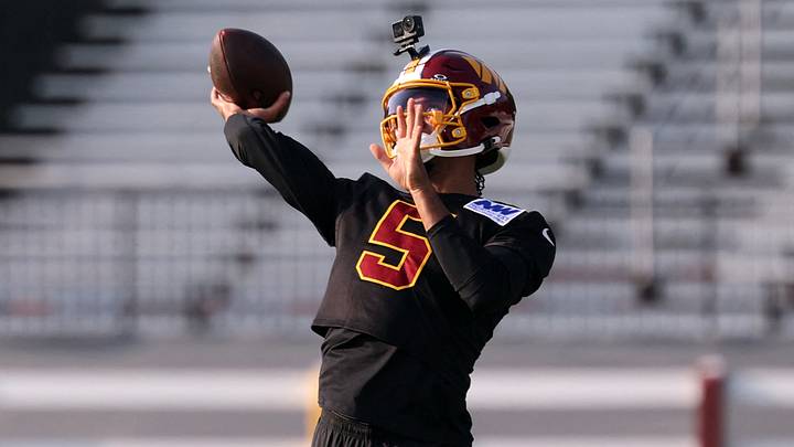 Jul 29, 2026; Ashburn, VA, USA; Washington Commanders quarterback Jayden Daniels (5) passes the ball during a drill on day one of training camp at theBigBear.ai Performance Center at Commanders Park. Mandatory Credit: Geoff Burke-Imagn Images Jul 29, 2026; Ashburn, VA, USA; Washington Commanders quarterback Jayden Daniels (5) passes the ball during a drill on day one of training camp at theBigBear.ai Performance Center at Commanders Park. Mandatory Credit: Geoff Burke-Imagn Images