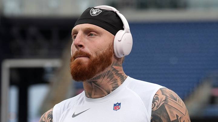 Oct 11, 2026; Foxborough, Massachusetts, USA; Las Vegas Raiders defensive end Maxx Crosby (98) wears headphones while warming up before a game against the New England Patriots at Gillette Stadium. Mandatory Credit: David Butler II-Imagn Images Oct 11, 2026; Foxborough, Massachusetts, USA; Las Vegas Raiders defensive end Maxx Crosby (98) wears headphones while warming up before a game against the New England Patriots at Gillette Stadium. Mandatory Credit: David Butler II-Imagn Images