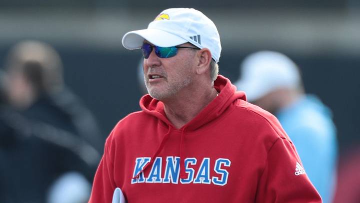 Kansas football head coach Lance Leipold talks with assistants during practice at the University of Kansas on Thursday, April 9, 2026. Kansas football head coach Lance Leipold talks with assistants during practice at the University of Kansas on Thursday, April 9, 2026.