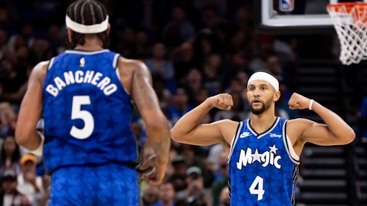 Nov 11, 2023; Orlando, Florida, USA; Orlando Magic guard Jalen Suggs (4) gestures towards Orlando Magic forward Paolo Banchero (5) during the first half against the Milwaukee Bucks at Amway Center. Mandatory Credit: Matt Pendleton-Imagn Images