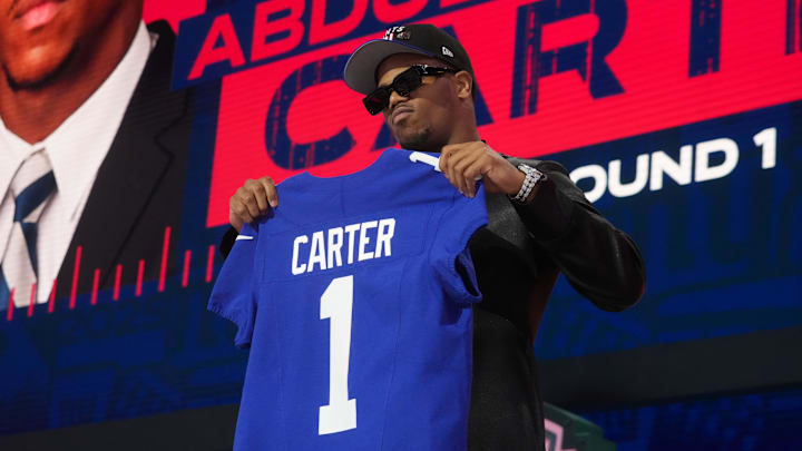 Carter was handed No. 1 on draft night, but tried to get himself a couple of retired numbers for his actual on-field digits.