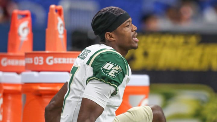 DeSoto's Ethan Feaster warms up after halftime during Friday's game at the Alamodome on Sept. 13, 2024, in San Antonio, Texas. DeSoto's Ethan Feaster warms up after halftime during Friday's game at the Alamodome on Sept. 13, 2024, in San Antonio, Texas.