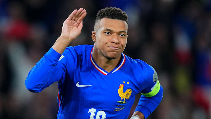 Kylian Mbappé celebrating after scoring his latest goal for France.