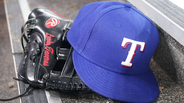 Jul 26, 2024; Toronto, Ontario, CAN; The hat and glove of Texas Rangers fielder Leody Taveras (3) during a game against the Toronto Blue Jays at Rogers Centre. 