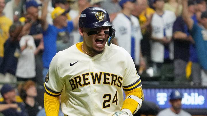 Oct 12, 2026; Milwaukee, Wisconsin, USA;  Milwaukee Brewers catcher William Contreras (24) reacts while running after hitting an RBI single against Los Angeles Dodgers pitcher Brock Stewart (not pictured) during the sixth inning in game two of the NLCS for the 2026 MLB Playoffs at American Family Field.  Mandatory Credit: Michael McLoone-Imagn Images