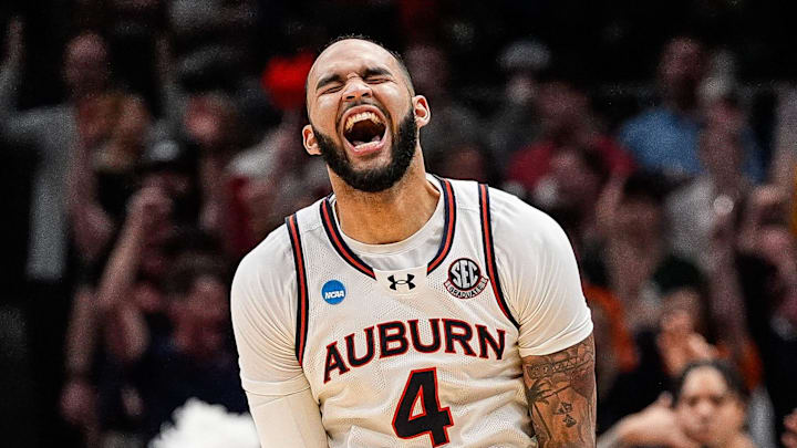 Auburn forward Johni Broome celebrates a play.