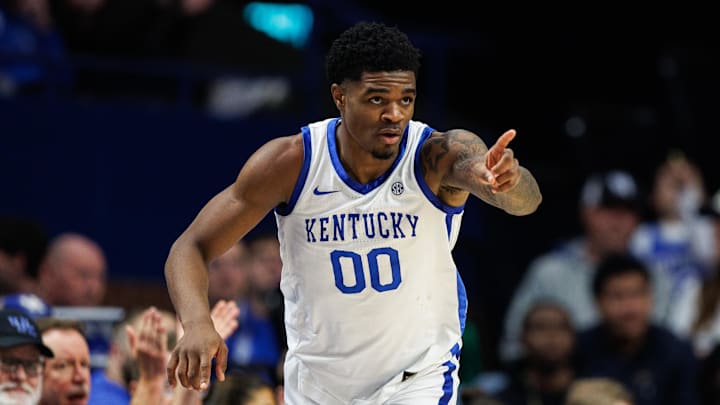 Nov 21, 2025; Lexington, Kentucky, USA; Kentucky Wildcats guard Otega Oweh (00) reacts after making a three point basket during the first half against the Loyola (MD) Greyhounds at Rupp Arena at Central Bank Center. Mandatory Credit: Jordan Prather-Imagn Images