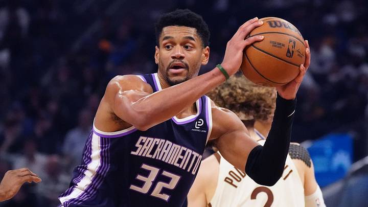 Apr 7, 2026; San Francisco, California, USA;  Sacramento Kings center Dylan Cardwell (32) looks to pass against the Golden State Warriors in the second quarter at Chase Center. Mandatory Credit: David Gonzales-Imagn Images