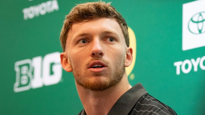 Oregon defensive back Dillon Thieneman speaks with reporters during Oregon football’s Media Day on July 28, 2025, at Autzen Stadium in Eugene.