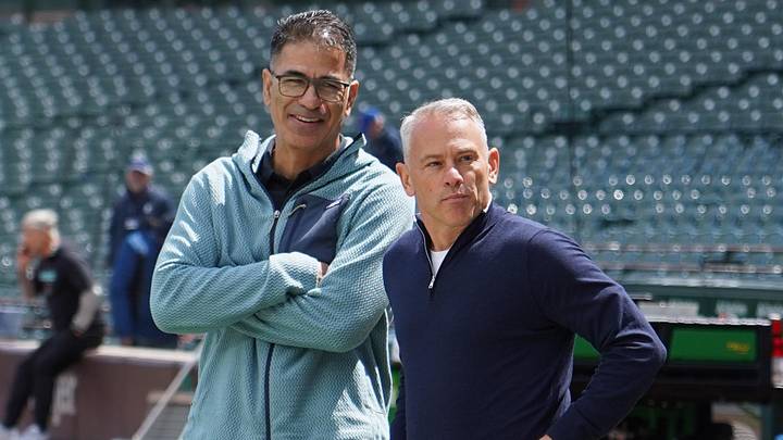 May 1, 2026; Chicago, Illinois, USA; Arizona Diamondbacks executive Jason McLeod (left) and Chicago Cubs president Jed Hoyer chat on the field before the game at Wrigley Field. Mandatory Credit: David Banks-Imagn Images