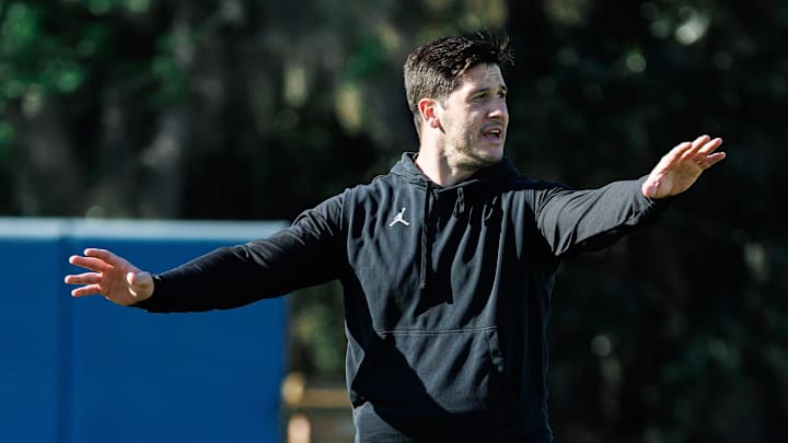 Florida Gators co-defensive coordinator Vinnie Sunseri gestures while Florida Gators inside linebacker Jaden Robinson (29) watches during spring football practice at Heavener Football Complex at the University of Florida in Gainesville, FL on Tuesday, March 11, 2025. [Matt Pendleton/Gainesville Sun]