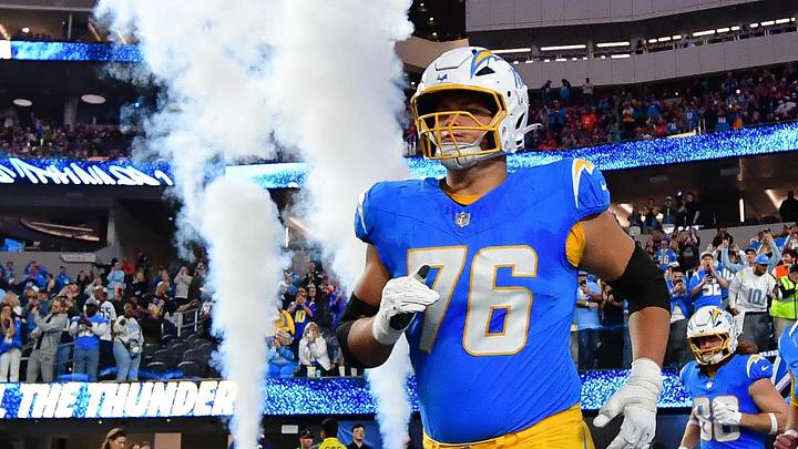 Dec 19, 2024; Inglewood, California, USA; Los Angeles Chargers offensive tackle Joe Alt (76) and the offense are introduced before playing against the Denver Broncos at SoFi Stadium. Mandatory Credit: Gary A. Vasquez-Imagn Images Dec 19, 2024; Inglewood, California, USA; Los Angeles Chargers offensive tackle Joe Alt (76) and the offense are introduced before playing against the Denver Broncos at SoFi Stadium. Mandatory Credit: Gary A. Vasquez-Imagn Images