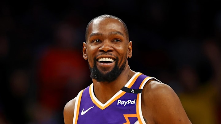 Mar 24, 2025; Phoenix, Arizona, USA; Phoenix Suns forward Kevin Durant (35) celebrates after a play during the fourth quarter against the Milwaukee Bucks at Footprint Center. Mandatory Credit: Mark J. Rebilas-Imagn Images