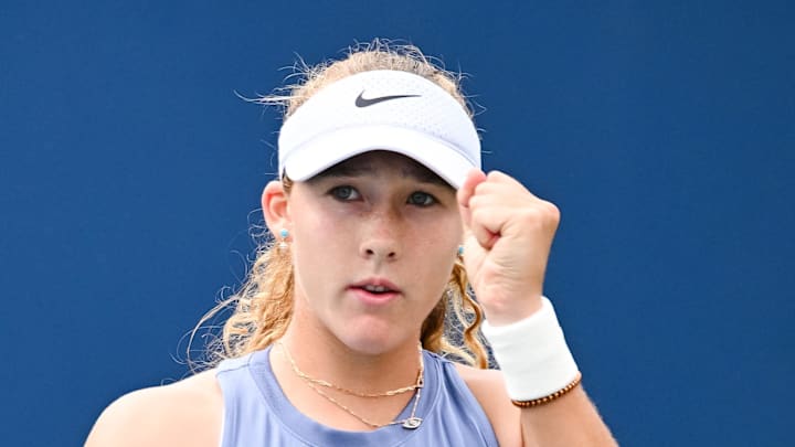 Mirra Andreeva reacts after scoring a point against McCartney Kessler 