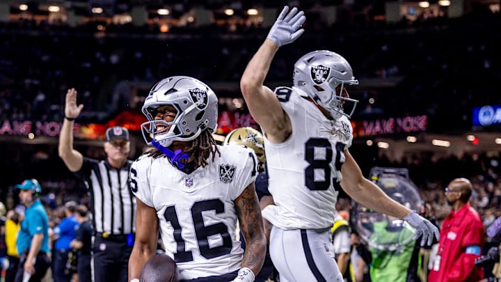 Dec 29, 2024; New Orleans, Louisiana, USA; Las Vegas Raiders wide receiver Jakobi Meyers (16) runs in from a touchdown against New Orleans Saints cornerback Alontae Taylor (1) during the first half at Caesars Superdome. Mandatory Credit: Stephen Lew-Imagn Images Dec 29, 2024; New Orleans, Louisiana, USA; Las Vegas Raiders wide receiver Jakobi Meyers (16) runs in from a touchdown against New Orleans Saints cornerback Alontae Taylor (1) during the first half at Caesars Superdome. Mandatory Credit: Stephen Lew-Imagn Images