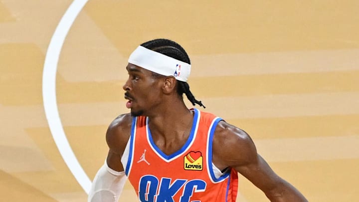 Dec 17, 2024; Las Vegas, Nevada, USA; Oklahoma City Thunder guard Shai Gilgeous-Alexander (2) dribbles against Milwaukee Bucks guard Andre Jackson Jr. (44) during the 3rd quarter of the Emirates NBA Cup championship game at T-Mobile Arena. Mandatory Credit: Candice Ward-Imagn Images Dec 17, 2024; Las Vegas, Nevada, USA; Oklahoma City Thunder guard Shai Gilgeous-Alexander (2) dribbles against Milwaukee Bucks guard Andre Jackson Jr. (44) during the 3rd quarter of the Emirates NBA Cup championship game at T-Mobile Arena. Mandatory Credit: Candice Ward-Imagn Images
