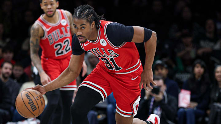 Feb 9, 2026; Brooklyn, New York, USA; Chicago Bulls guard Jaden Ivey (31) dribbles up court against the Brooklyn Nets during the first quarter at Barclays Center. Mandatory Credit: Vincent Carchietta-Imagn Images