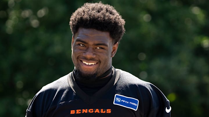 Cincinnati Bengals defensive end Cam Sample (96) walks to the practice field at the Bengals NFL practice in Cincinnati on Tuesday, June 4, 2024. Cincinnati Bengals defensive end Cam Sample (96) walks to the practice field at the Bengals NFL practice in Cincinnati on Tuesday, June 4, 2024.