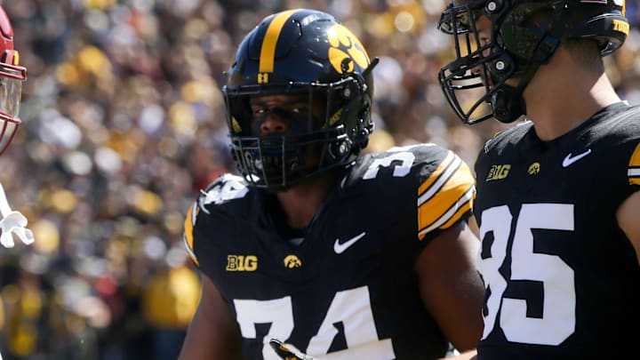 Iowa State’s Darien Porter (10) shakes hands with Iow’s Jay Higgins (34) and Luke Lachey (85) after the coin toss at the CyHawk game Saturday, Sept. 7, 2024 at Kinnick Stadium in Iowa City, Iowa. Iowa State’s Darien Porter (10) shakes hands with Iow’s Jay Higgins (34) and Luke Lachey (85) after the coin toss at the CyHawk game Saturday, Sept. 7, 2024 at Kinnick Stadium in Iowa City, Iowa.