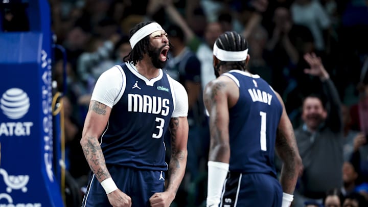 Apr 2, 2025; Dallas, Texas, USA;  Dallas Mavericks forward Anthony Davis (3) reacts in front of Atlanta Hawks guard Terance Mann (14) during the fourth quarter at American Airlines Center. Mandatory Credit: Kevin Jairaj-Imagn Images