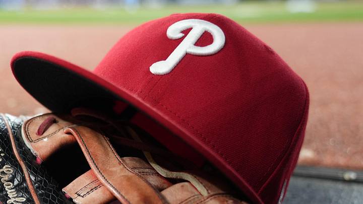 Jun 8, 2026; Toronto, Ontario, CAN; The glove and hat of Philadelphia Phillies center fielder Justin Crawford (2) in the dugout during a game against the Toronto Blue Jays at Rogers Centre. 
