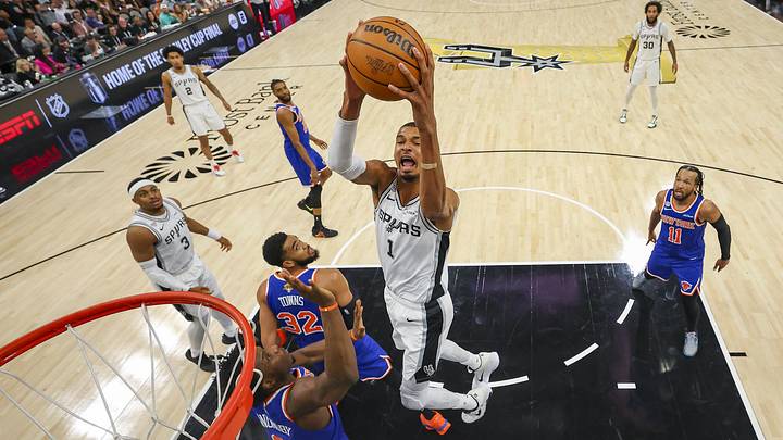 Jun 5, 2026; San Antonio, Texas, USA; San Antonio Spurs forward Victor Wembanyama (1) dunks the ball over New York Knicks center Karl-Anthony Towns (32) and forward O.G. Anunoby (8) during Game 2 of the 2026 NBA Finals at Frost Bank Center. Jun 5, 2026; San Antonio, Texas, USA; San Antonio Spurs forward Victor Wembanyama (1) dunks the ball over New York Knicks center Karl-Anthony Towns (32) and forward O.G. Anunoby (8) during Game 2 of the 2026 NBA Finals at Frost Bank Center.
