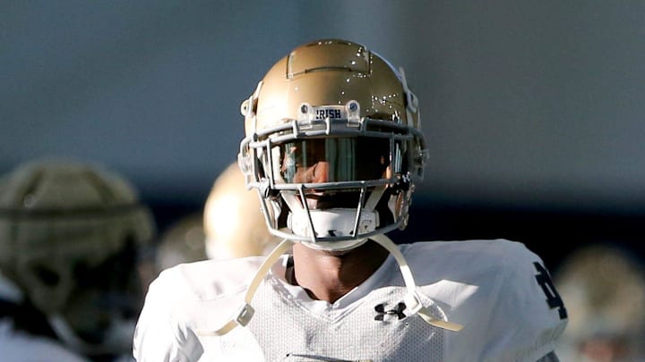 Notre Dame cornerback Cam Hart (5) goes through drills Wednesday, April 12, 2023, during spring