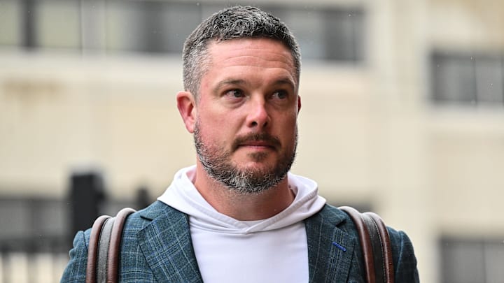 Oregon Ducks head coach Dan Lanning enters Kinnick Stadium before the game against the Iowa Hawkeyes. 