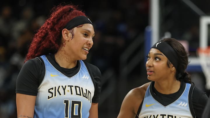 Kamilla Cardoso and Angel Reese