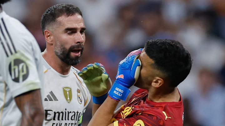 Dani Carvajal (left) headbutted Marseille goalkeeper Gerónimo Rulli. Dani Carvajal (left) headbutted Marseille goalkeeper Gerónimo Rulli.