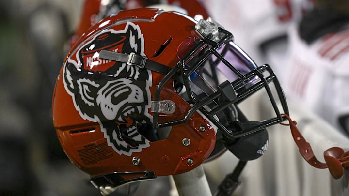 Nov 13, 2021; Winston-Salem, North Carolina, USA; A North Carolina State Wolfpack helmet seen on the sideline during the second half against the Wake Forest Demon Deacons at Truist Field. Mandatory Credit: William Howard-Imagn Images