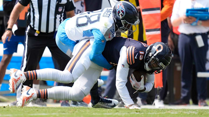 Keean Allen goes to the turf at the first down marker for the Bears against the Titans in the season opener. Keean Allen goes to the turf at the first down marker for the Bears against the Titans in the season opener.