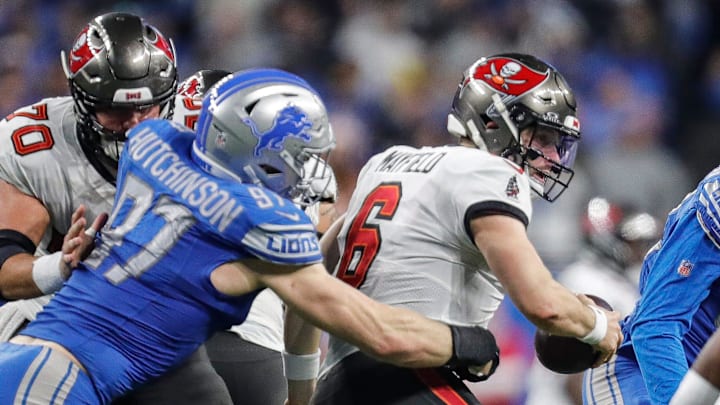 Detroit Lions defensive end Aidan Hutchinson (97) tackles Tampa Bay Buccaneers quarterback Baker Mayfield (6) Detroit Lions defensive end Aidan Hutchinson (97) tackles Tampa Bay Buccaneers quarterback Baker Mayfield (6)