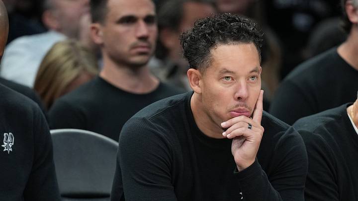 Oct 16, 2026; San Antonio, Texas, USA; San Antonio Spurs coach Mitch Johnson observes the second half of play against the Sacramento Kings at Frost Bank Center. Oct 16, 2026; San Antonio, Texas, USA; San Antonio Spurs coach Mitch Johnson observes the second half of play against the Sacramento Kings at Frost Bank Center.