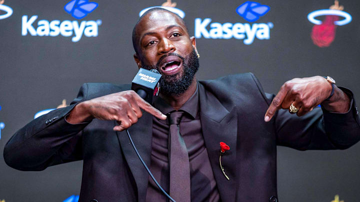 Dwyane Wade strikes the same pose immortalized in his statue during a press conference on October 27, 2024. Dwyane Wade strikes the same pose immortalized in his statue during a press conference on October 27, 2024.