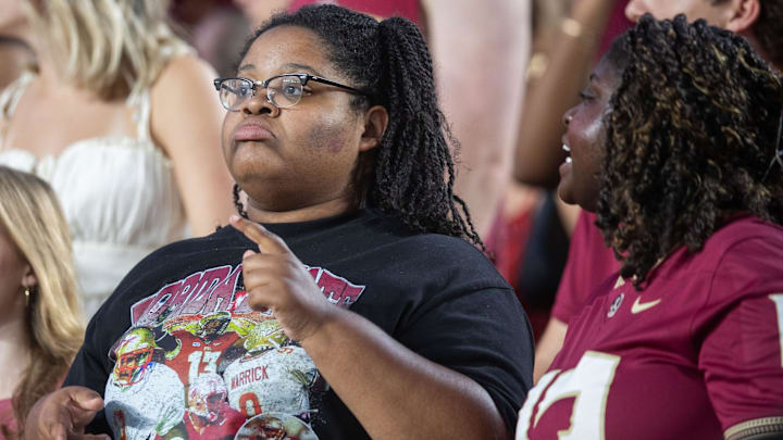 Florida State Seminole fans cheer on the football team as they play the Miami Hurricanes on Saturday, Oct. 4, 2025.