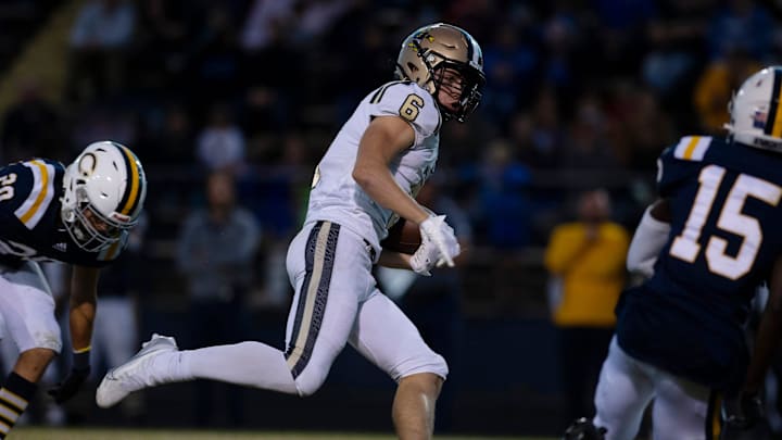 Jasper RB Carter Holsworth (6) heads for the end zone 