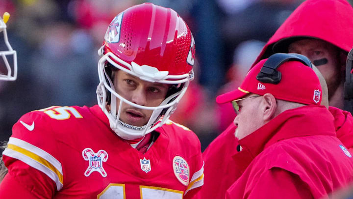 Dec 21, 2024; Kansas City, Missouri, USA; Kansas City Chiefs quarterback Patrick Mahomes (15) talks with head coach Andy Reid during the second half against the Houston Texans at GEHA Field at Arrowhead Stadium. Mandatory Credit: Denny Medley-Imagn Images