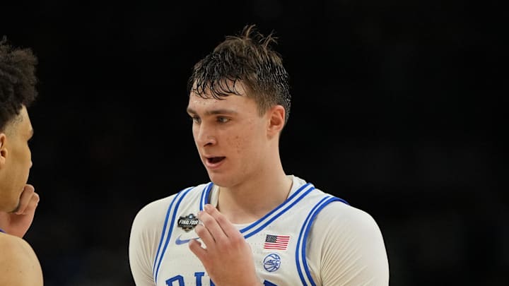 Apr 5, 2025; San Antonio, TX, USA; Duke Blue Devils forward Cooper Flagg (2) talks with guard Tyrese Proctor (5) after a play against the Houston Cougars during the second half in the semifinals of the men's Final Four of the 2025 NCAA Tournament at the Alamodome. Mandatory Credit: Bob Donnan-Imagn Images